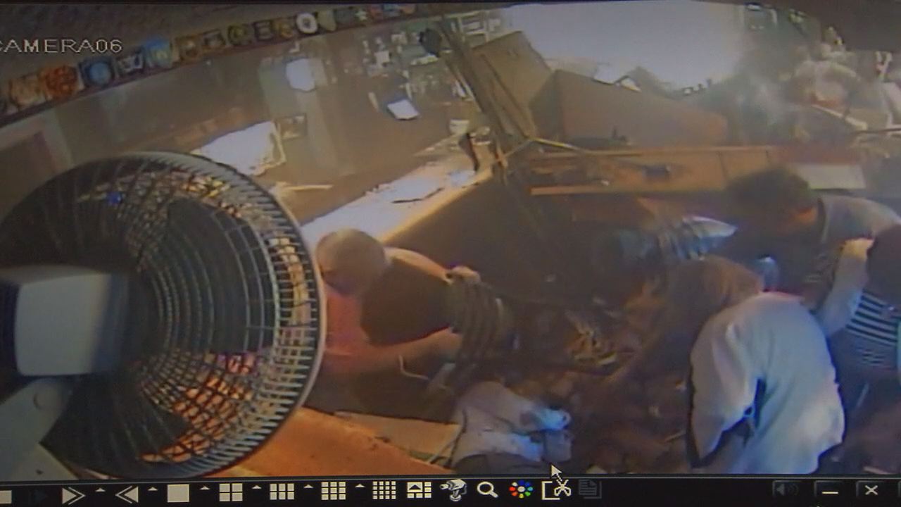 Surveillance video shows car crashes into Maryland restaurant