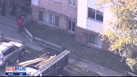 Police searching for driver who crashed into apartments and then fled scene
