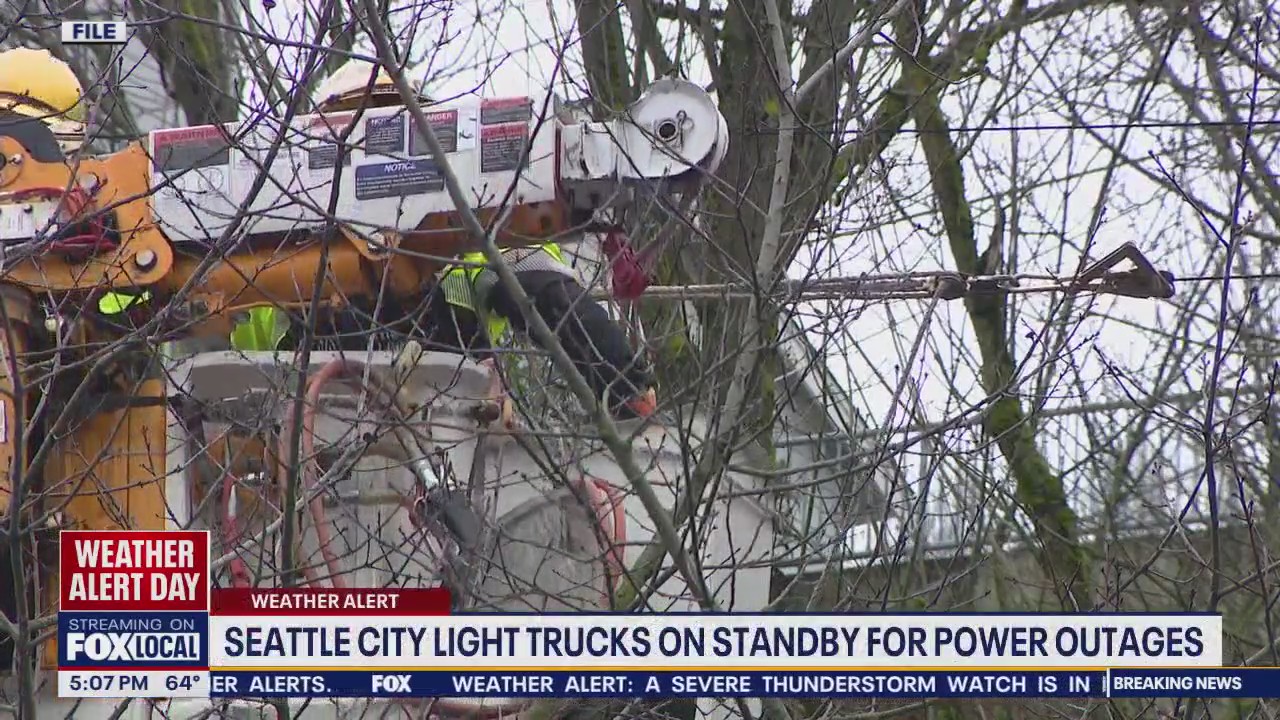Seattle city light trucks on standby incase of power outages