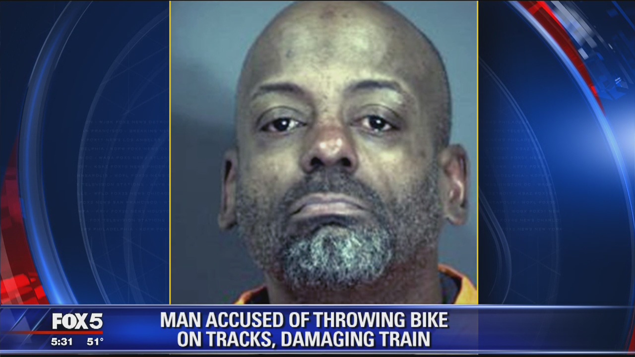 Fare evader throws bike onto Metro tracks, causes crash, then starts trash fire, police say