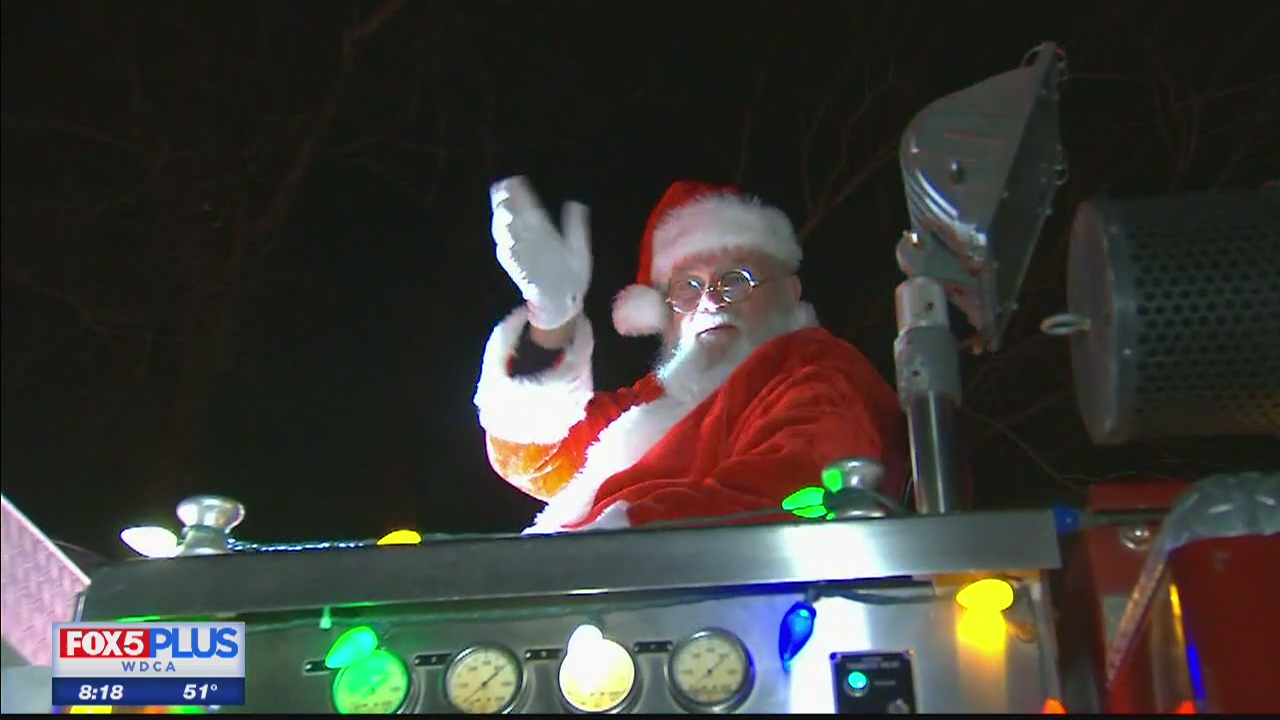 Santa spreads holiday cheer on fire truck in Rockville