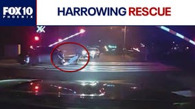 NJ officers rescue man stuck on train tracks