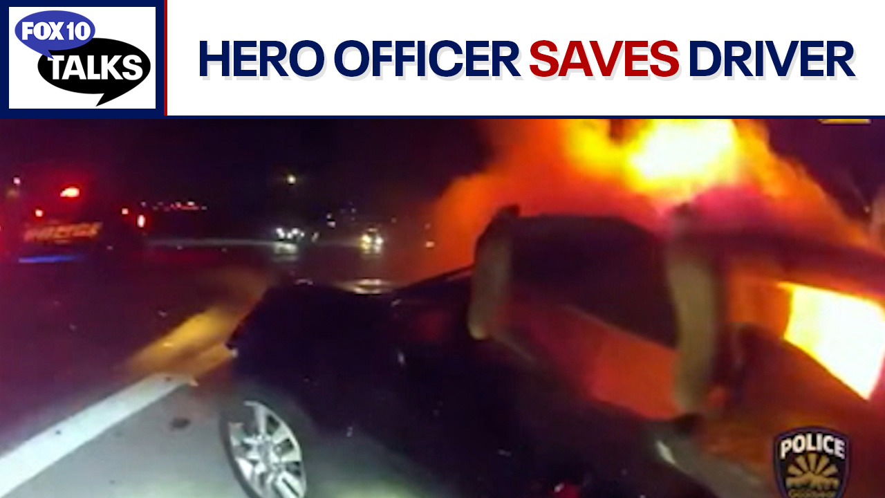 Woman rescued from burning car l FOX 10 Talks