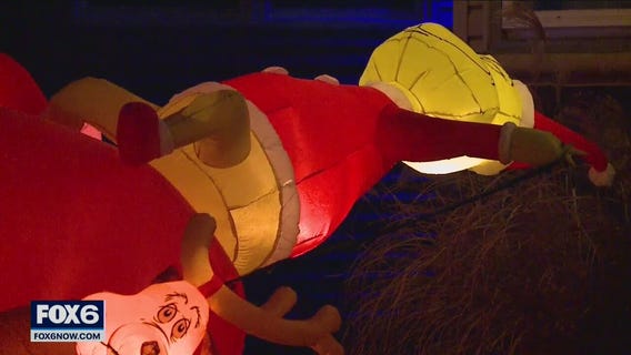 Wind threatens Candy Cane Lane inflatables