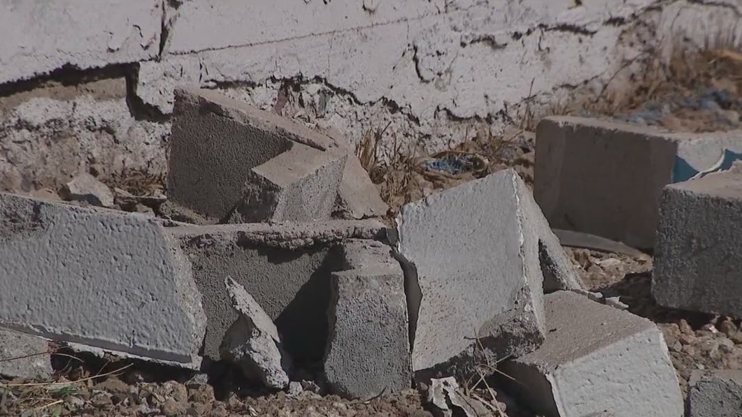 Car flips into Phoenix yard