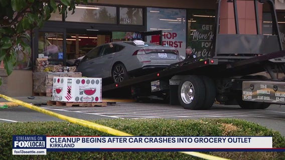 Cleanup begins after car crashes through Kirkland, WA Grocery Outlet
