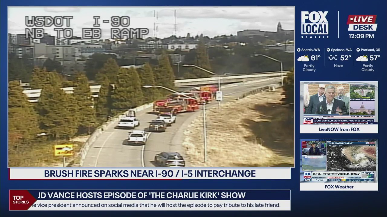 Brush fire sparks along I-90 in Seattle, WA