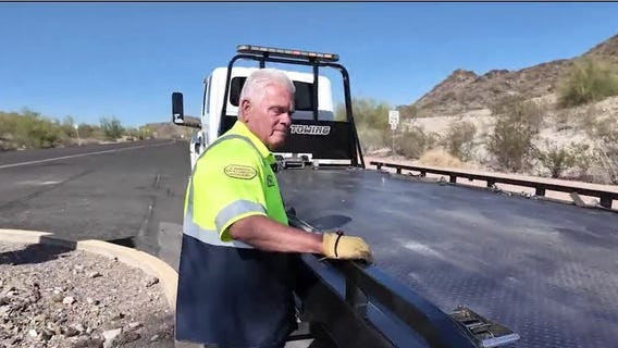 Tow truck drivers brave the heat to help stranded drivers