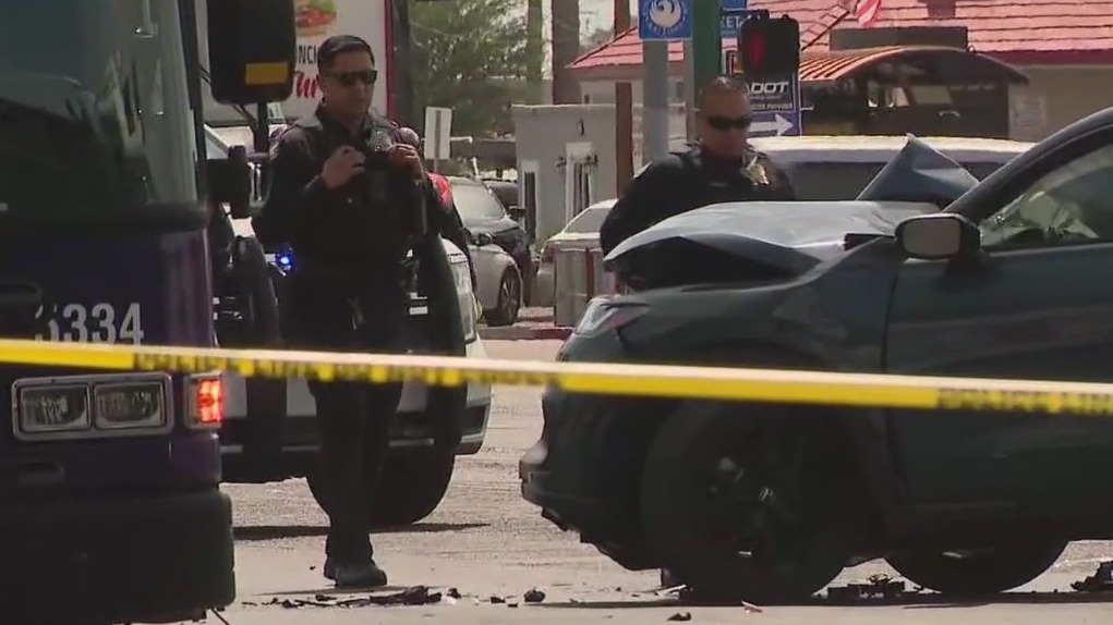 Woman killed, driver arrested in crash involving bus