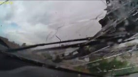 Power lines fall on car during dust storm