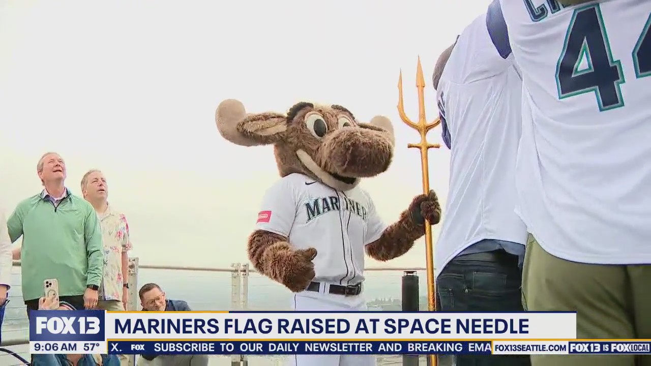 Mariners flag raised atop the Space Needle