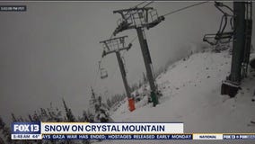 Snow falls over WA mountains
