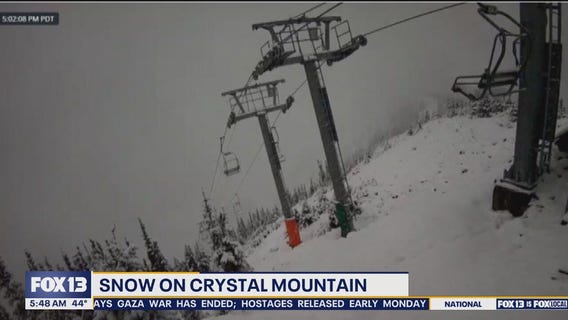 Snow falls over WA mountains