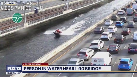 Water rescue on I-90 bridge stalls traffic as man jumps into Lake Washington in Seattle