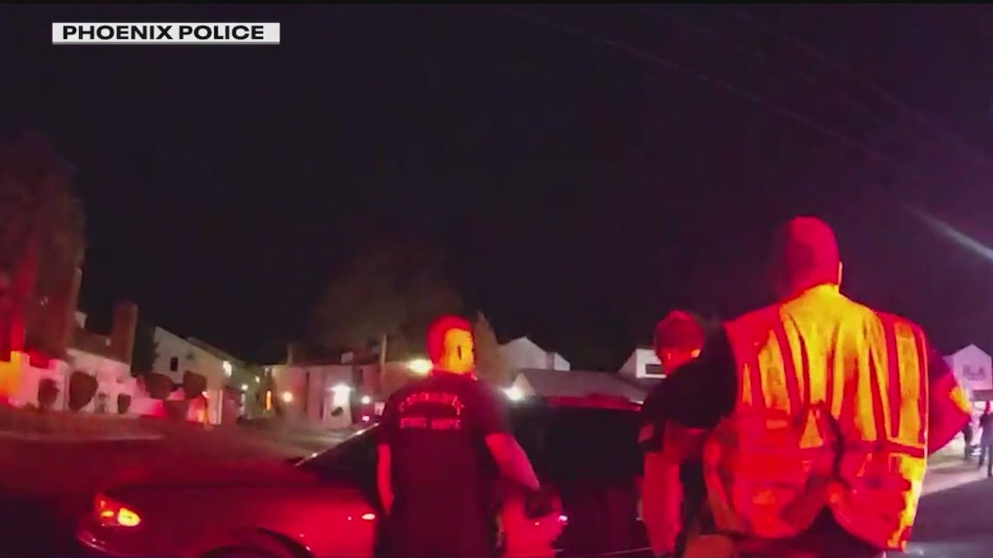 Video captures rescue of pinned motorcyclist