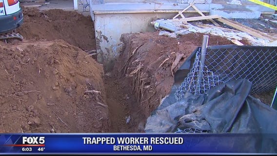 Worker rescued after being partially trapped in trench in Bethesda