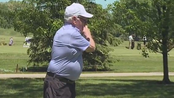 Alzheimer's patient fulfills dream by playing golf with family