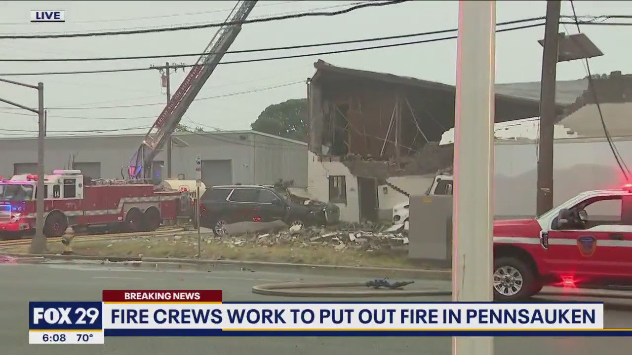 Fire crews work to extinguish flames at Pennsauken autobody shop