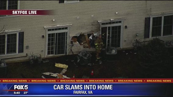 Car crashes into home in Lorton