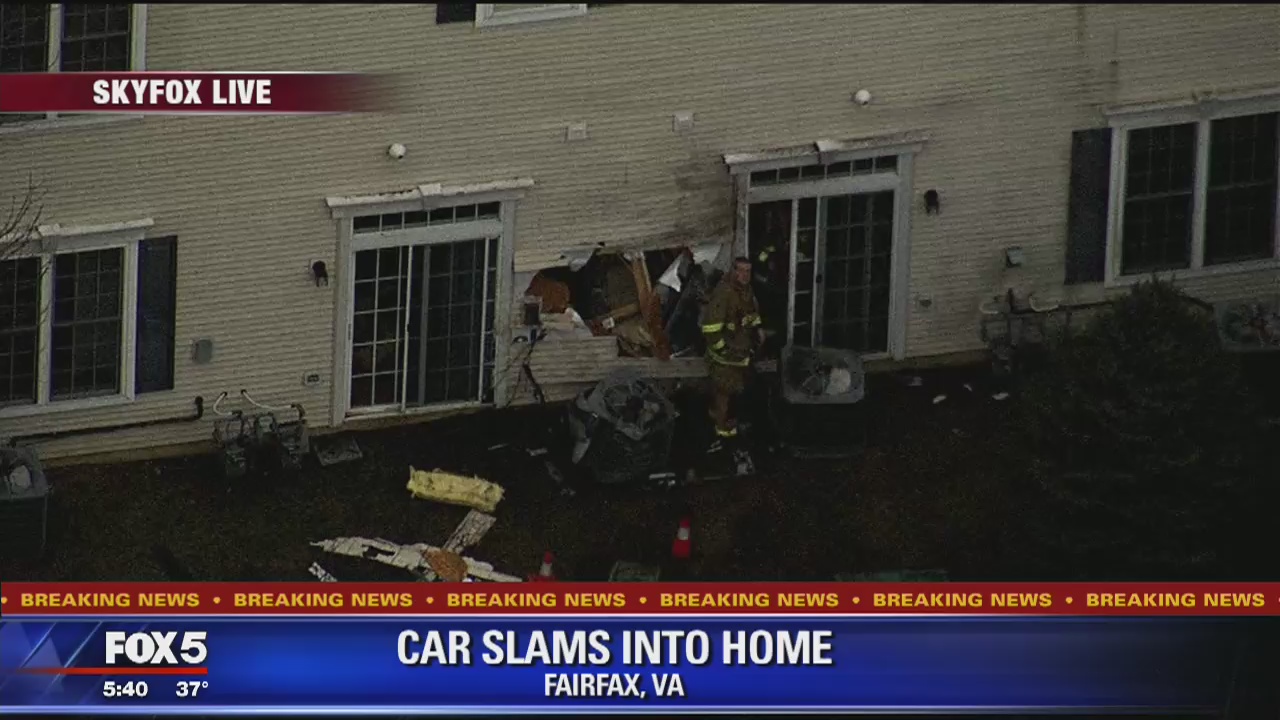 Car crashes into home in Lorton