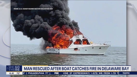 Coast Guard rescues man from water after boat catches fire in Delaware Bay