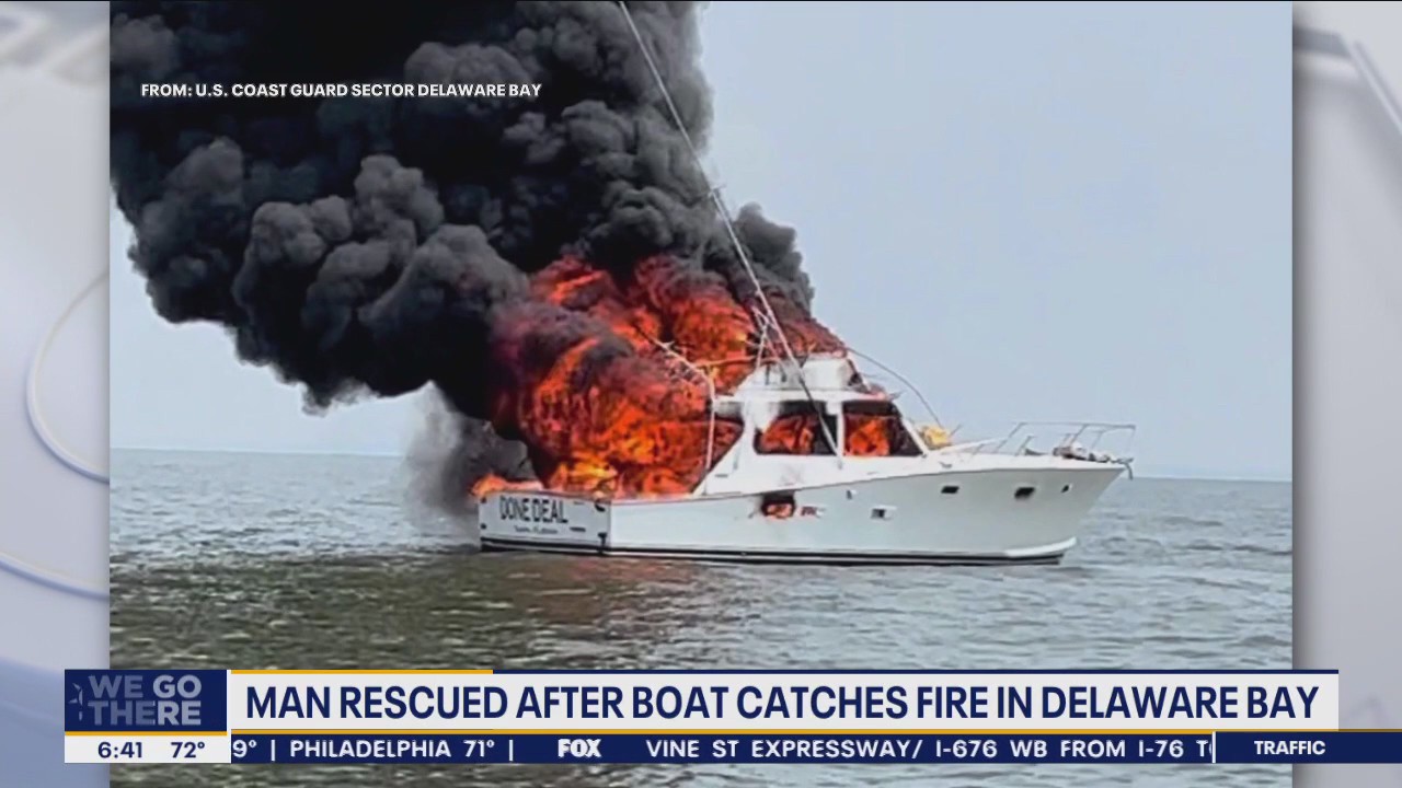 Coast Guard rescues man from water after boat catches fire in Delaware Bay