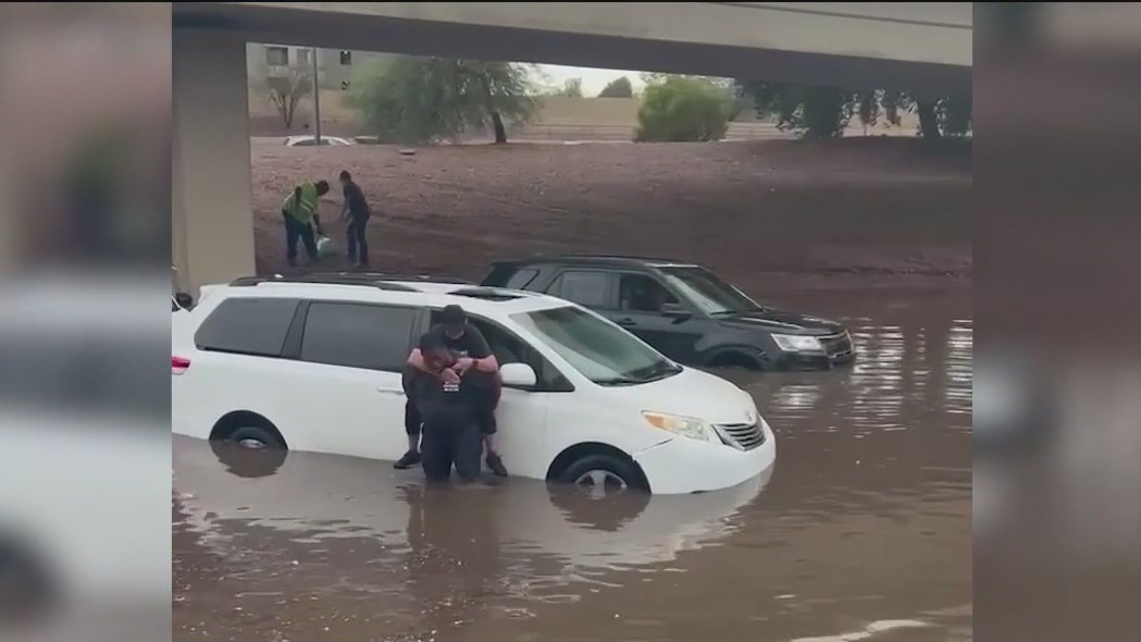 Valley man leaving hospital after wife gives birth stops to help stranded drivers in floodwaters