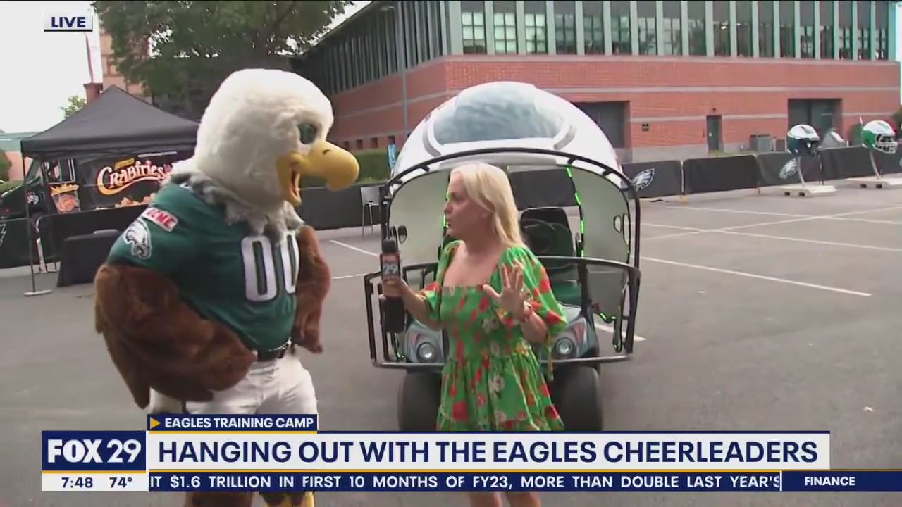 Jenn hangs with Swoop, Eagles cheerleaders ahead of practice