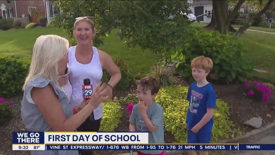 Emotional goodbye at the bus stop for kids' first day of school