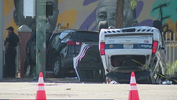 Phoenix PD officers, another person hurt in crash