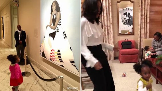Michelle Obama dances with 2-year-old who stared in awe of her painting at National Portrait Gallery