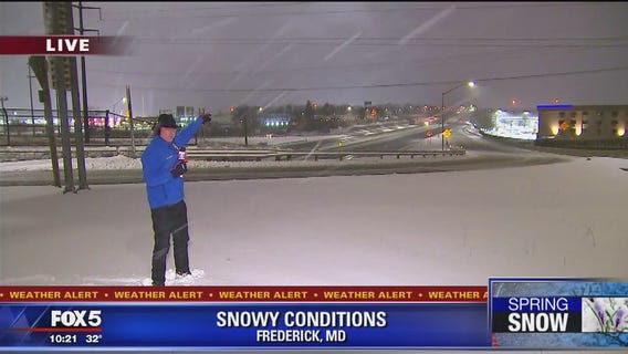 Snow covers roads in Frederick
