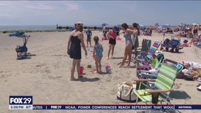 Summer is back as Ocean City opens the beach