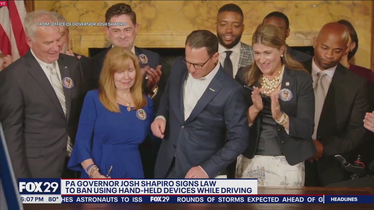 Governor Shapiro signs law to ban use of hand-held devices while ...