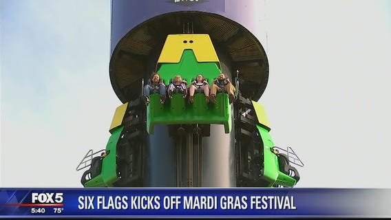 Couples get married on Voodoo Drop ride at Six Flags America