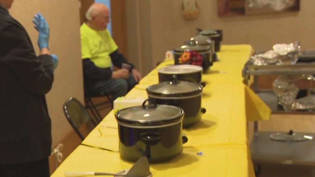 Getting the chili ready at St. Ann Center