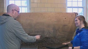 Seeding soil at the Hunger Task Force Farm