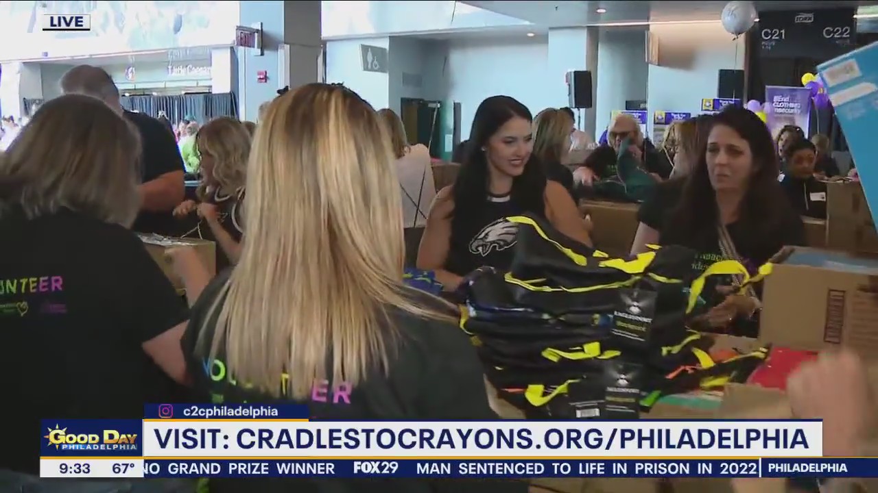 Cradles to Crayons filling bags for 15th annual backpack-a-thon