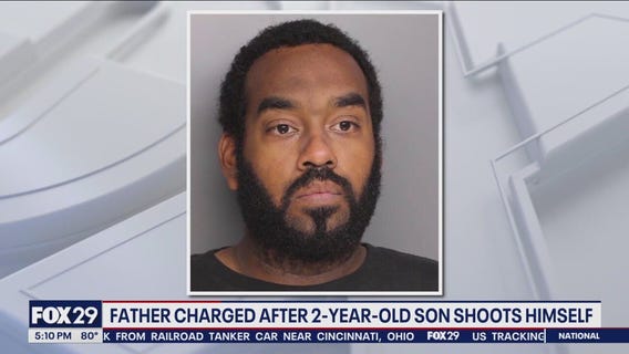 Father charged after 2-year-old shot himself