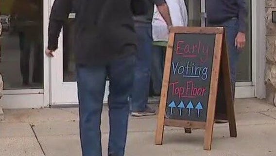 Early in-person voting opens in swing city