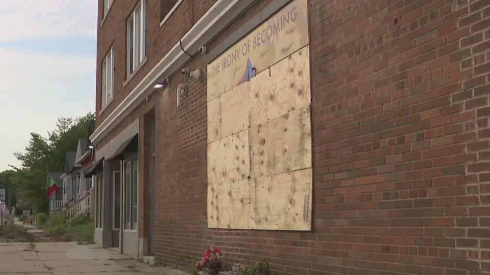 Controversial mural damage, 2 men charged