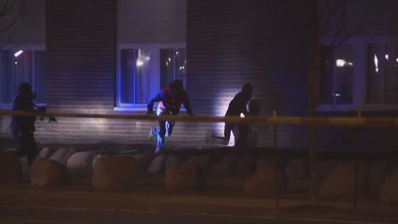 Police standoff, man jumps from window