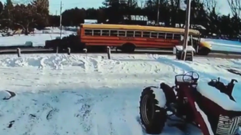 Truck slams into school bus as kids get off | FOX6 Milwaukee