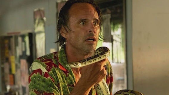 Walton Goggins gets bitten by a snake