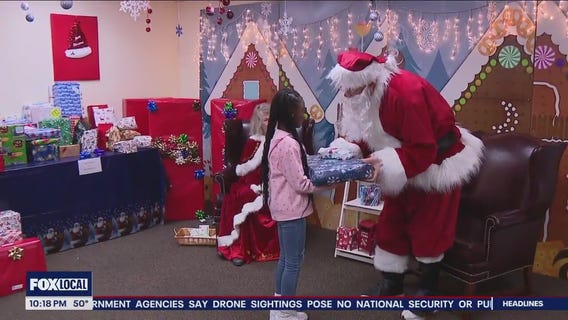 Families impacted by hardship treated to holiday party