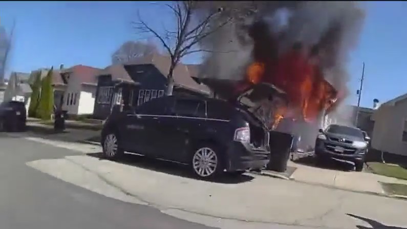 Officer rescues man, dogs from house fire