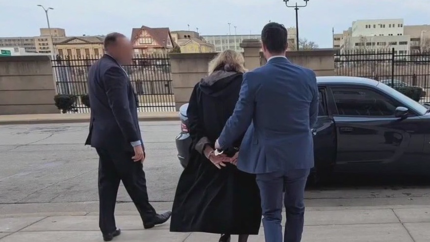 Conservative lawyer joins Dugan's defense team