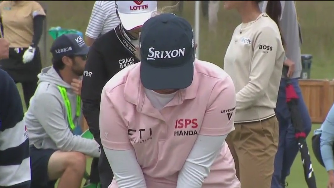 Golfer's husband is caddy for competitor