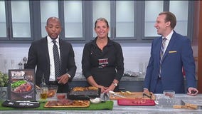 Grilled ribeye steaks and potatoes with paprika