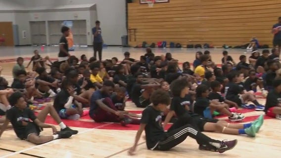 NBA champion gives back with youth basketball camp